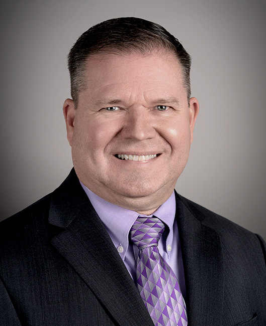 Professional headshot of Jonathon Taylor at Precious Plate.